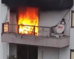 Imagem ilustrativa da imagem Criança é salva de apartamento em chamas por vizinhos heróis; vídeo