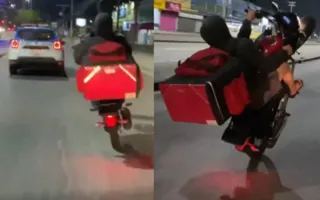 Imagem ilustrativa da imagem Motociclista ‘empina’ moto em frente a viatura da PM; vídeo