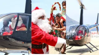 Imagem ilustrativa da imagem Papai Noel vira 'superstar' ao pousar de helicóptero em Niterói
