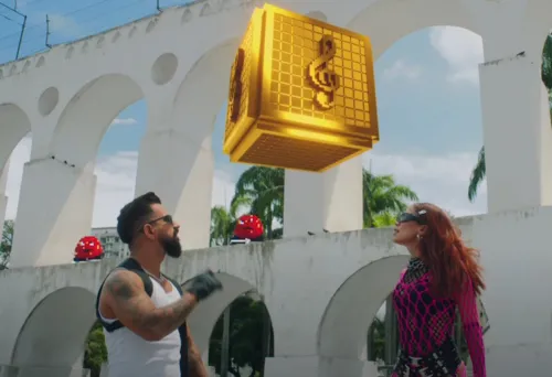 Imagem ilustrativa da imagem Arcos da Lapa viram cenário de game em clipe de Anitta e Dennis