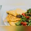 Imagem ilustrativa da imagem Omelete Baveuse, a receita perfeita para evitar atrasos pela manhã