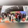 Giovanna e seu coordenador, Ricardo Viz, durante a Mostratec