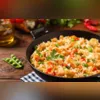 Imagem ilustrativa da imagem Arroz frito: o prato delicioso feito com as sobras da geladeira