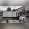 O homem segurando a tartaruga no Aterro do Flamengo
