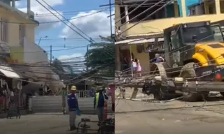 Imagem ilustrativa da imagem Trator derruba poste e deixa ruas sem luz na Baixada; vídeo