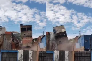 Imagem ilustrativa da imagem Casa de três andares desaba e assusta moradores, vídeo