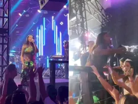 Imagem ilustrativa da imagem Mesma moeda: Ludmilla devolve água em fã durante show; vídeo