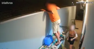 Imagem ilustrativa da imagem Vídeo: homem é morto com tiro no rosto após olhar por cima de muro