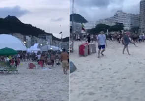 Imagem ilustrativa da imagem Vídeo: torcedores de Fluminense e Boca brigam em praia no Rio