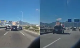 Imagem ilustrativa da imagem Carro flagrado transportando sofá na Ponte Rio-Niterói; vídeo