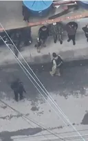 Imagem ilustrativa da imagem Cenas de guerra filmadas por drones nos complexos da Penha e do Alemão