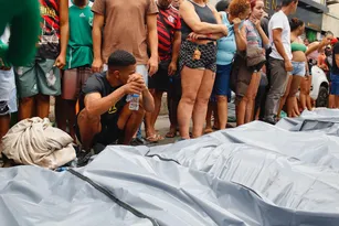 Imagem ilustrativa da imagem Relatório aponta tortura e execução em ação com 122 mortos no Rio