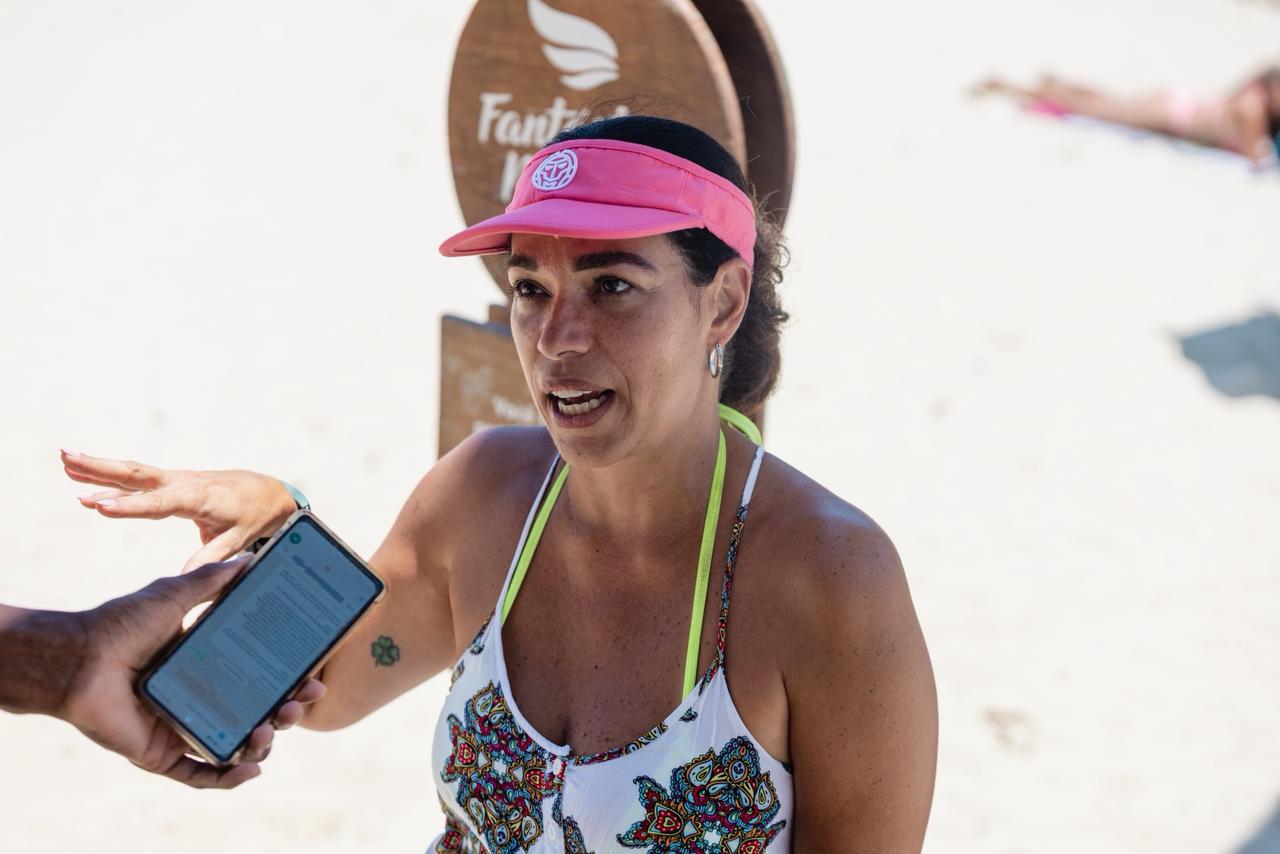 Irma de Castro aproveitou o calor, mesmo sabendo da sinalização da praia