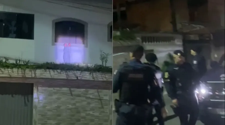 Policiais observam o 'corpo' na janela do morador em São Paulo