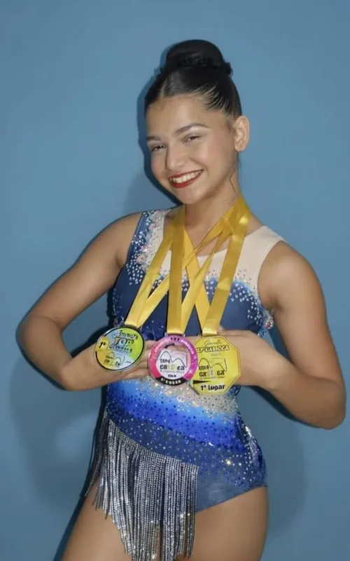 A atleta mirim é assistida pela técnica Ilca Portela