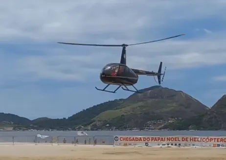 A viagem do Papai Noel, que veio  da Zona Oeste do Rio, durou 10 minutos