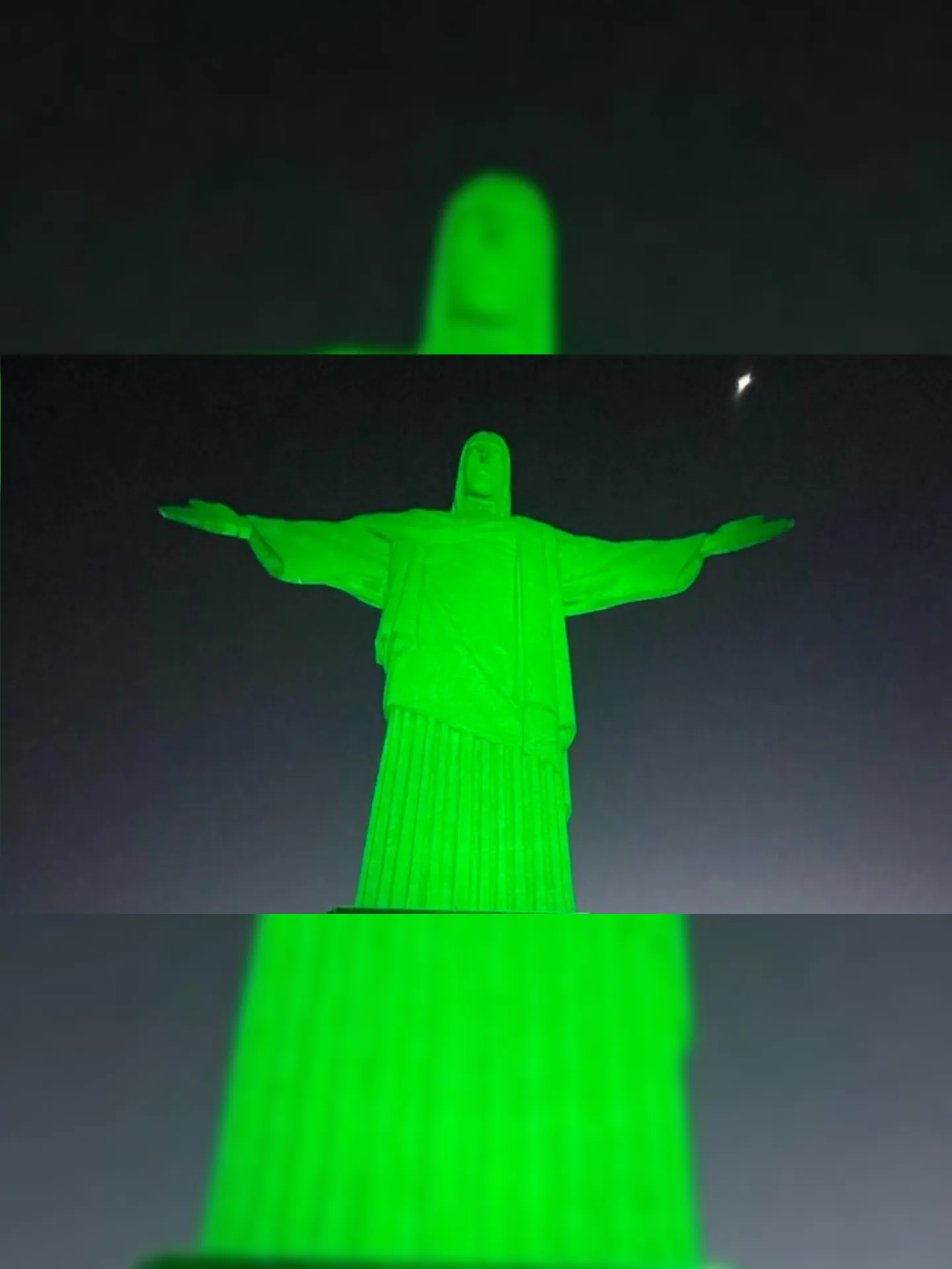 Cristo Redentor foi iluminado de verde, visando representar esperança para as crianças