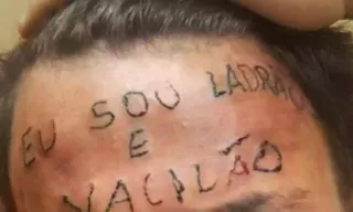 Imagem ilustrativa da imagem Jovem que teve testa tatuada com frase 'ladrão e vacilão' é preso