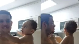 Imagem ilustrativa da imagem Bebê avisa ao pai surdo quando comida está quente no micro-ondas