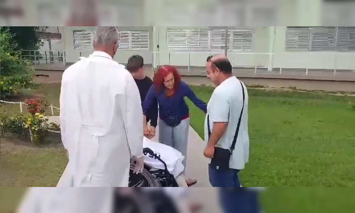 Escritora atacada por pitbulls 'passeia' no jardim de hospital