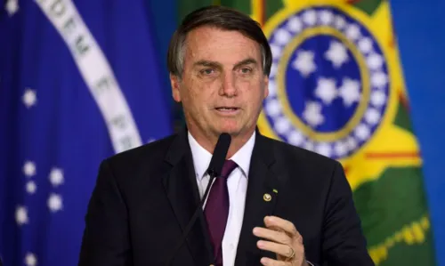 O presidente Jair Bolsonaro durante cerimônia alusiva à marca de 100 milhões de poupanças sociais digitais Caixa.