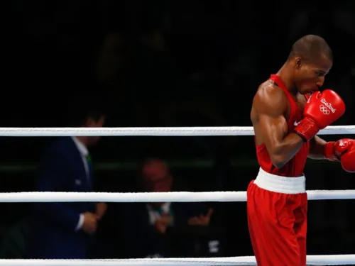 Rio de Janeiro - Por decisão unânime dos juízes, o lutador brasileiro Robson Conceição derrotou o francês Sofiane Oumiha e garantiu o ouro na categoria peso ligeiro, até 60 quilos (Fernando Frazão/Agência Brasil)