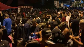 Imagem ilustrativa da imagem Multidão celebra conquista de facção criminosa na 'Terra Prometida' de SG