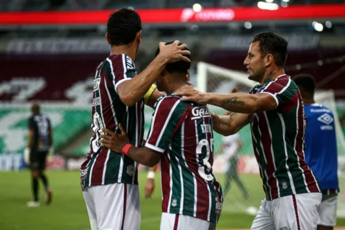 Imagem ilustrativa da imagem Fluminense passa pela Portuguesa e decide título com o Flamengo